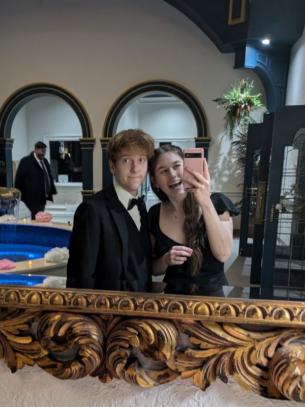Zach and his wife together at a formal celebration